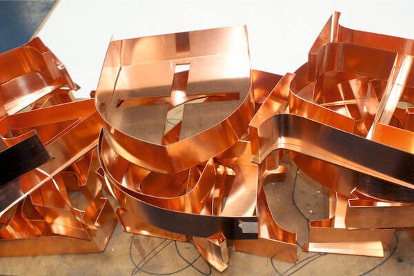 Copper raised letters